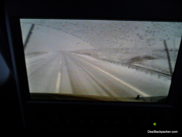 A view of the Snowy Road from the seat-back TV
