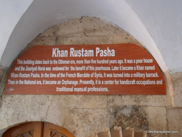 A signboard at the entrance to a former Khan